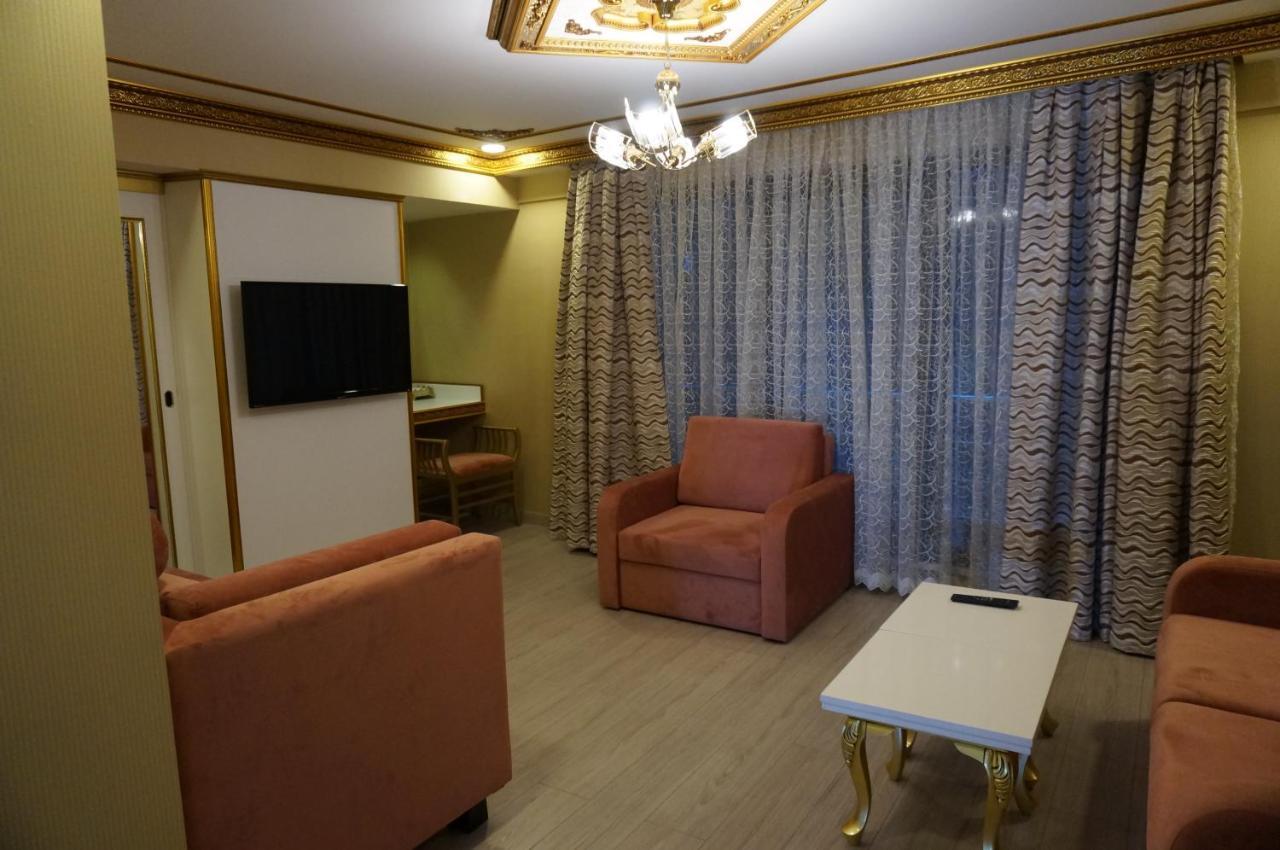 فندق فوسفورين اسطنبول المظهر الخارجي الصورة A living room in a hotel