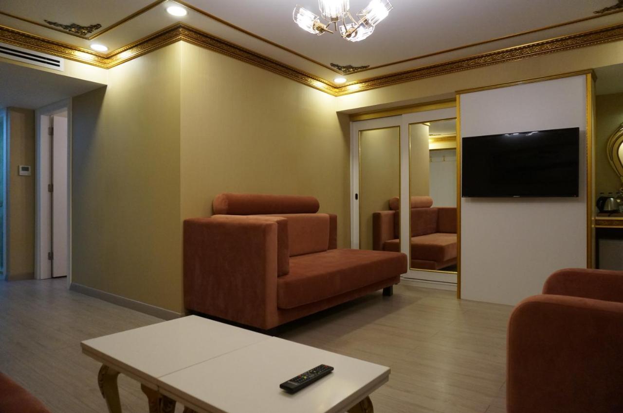 فندق فوسفورين اسطنبول المظهر الخارجي الصورة A living room in a hotel