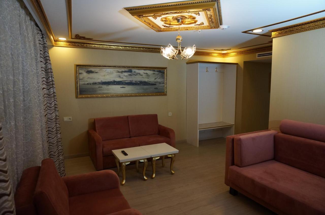 فندق فوسفورين اسطنبول المظهر الخارجي الصورة A living room in a hotel